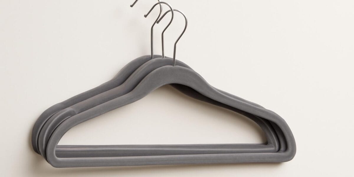 Studio ecommerce product image of slim velvet clothes hangers
