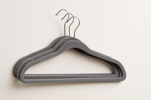 Studio ecommerce product image of slim velvet clothes hangers
